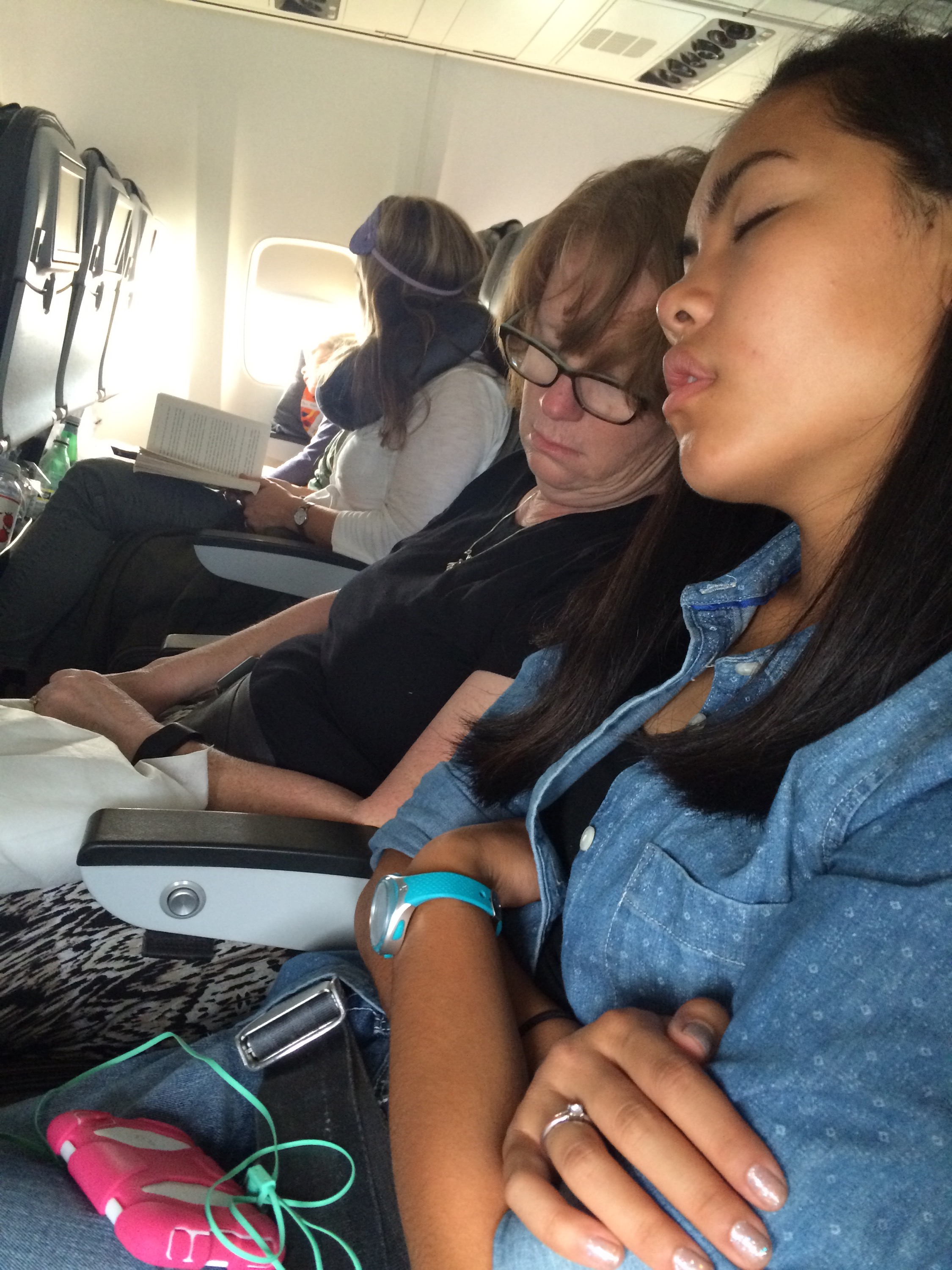 Mom and Hannah Sleeping on the Plane