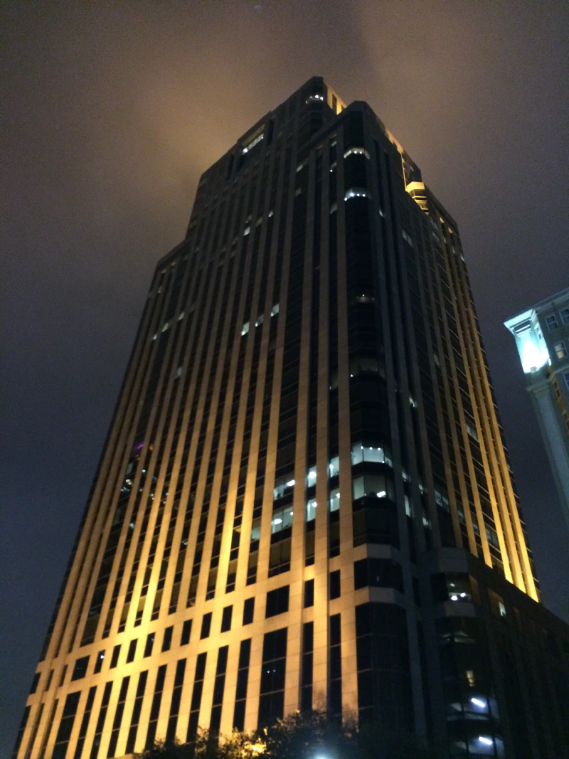 A cool building lit up at night