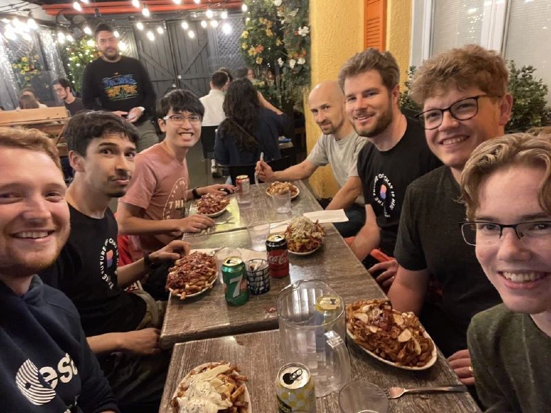 The team eating poutine