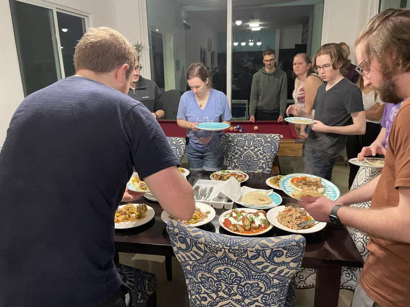 Our first dinner prepared by our private chefs, laid out on the dining room table.